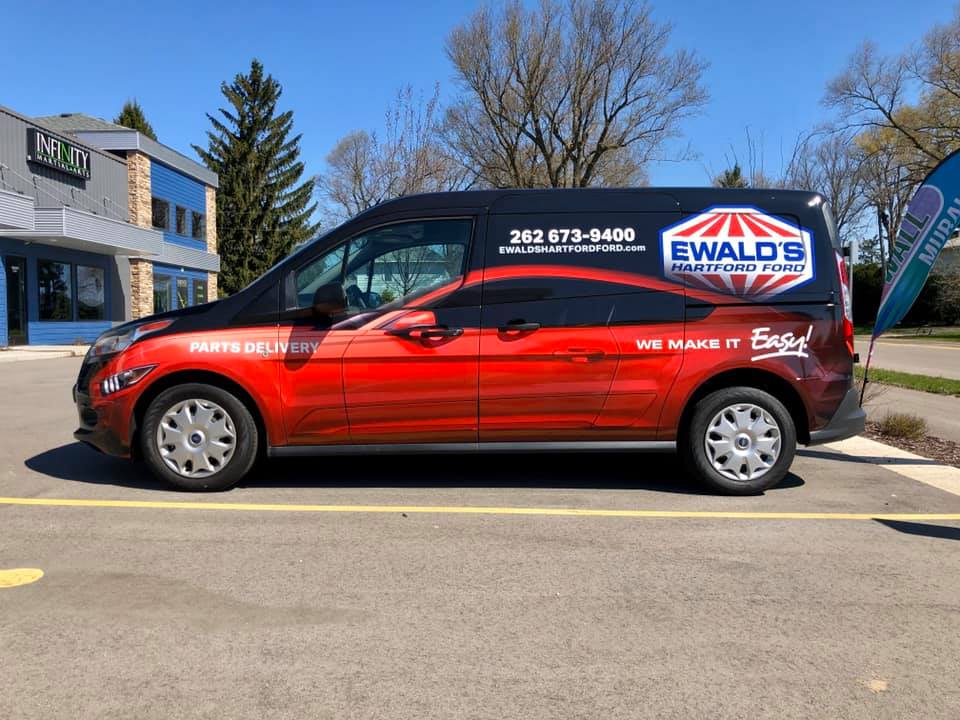 Madison Graphics Banner on a Vehicle